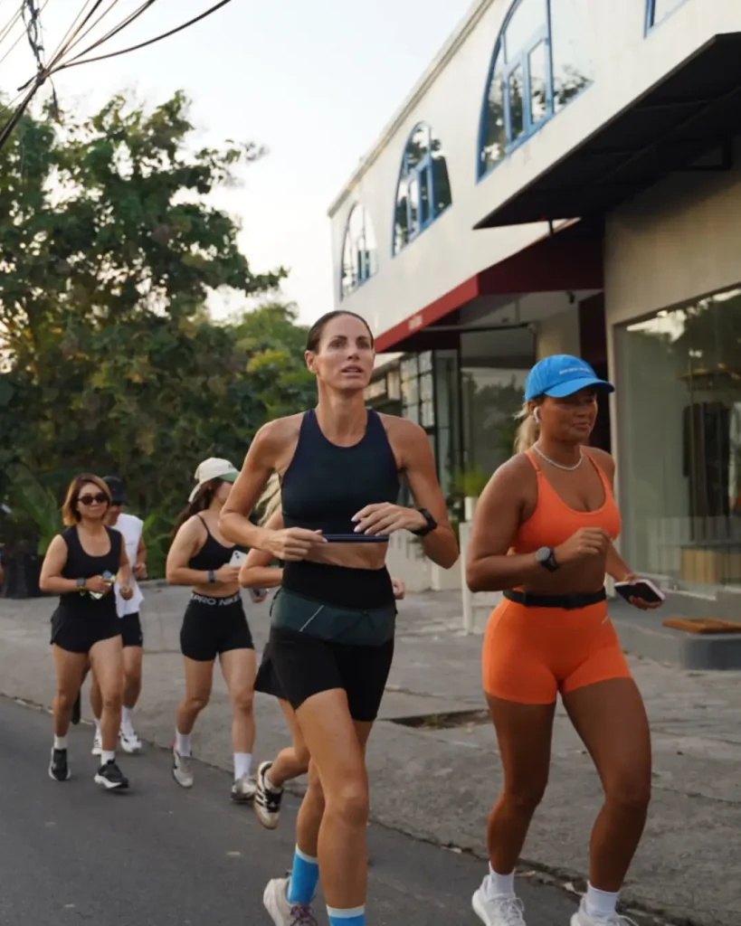 Participants running through the streets of Canggu during the Sunday Charity 5km Time Trial hosted by ARC and Rise & Sun Bali on July 27 2025.